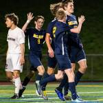 Bellevue players celebrate after Mason Wachter (No. 15) scored the only goal of the game against Mercer Island. Bellevue defeated Mercer Island 1-0 on May 2 in the final game of the 2019 regular season. Photo courtesy of Stephanie Ault Justus