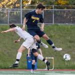 Bellevue player Alex Miller, right, battles for possession of the ball against Interlakes Julio Canimo, left, in the 3A KingCo tournament title game on May 7 in Bellevue. Photo courtesy of Stephanie Ault Justus