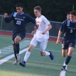 From left, Interlake sophomore Shloak Dutta, Juanita junior Sam Martin and Interlake senior Evan Gueye-oue compete in first-half action on May 9. Andy Nystrom / staff photo