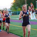 Bellevue Wolverines junior Katherine Forsberg, right, registered first-place finishes in the 1,600 and 3,200 at the 2019 KingCo 3A championship track meet. Photo courtesy of Don Borin/Stop Action Photography