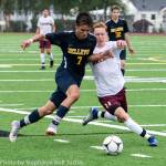 Bellevue Wolverines senior midfielder Alex Miller, left, and Lakeside senior defender Benjamin Brown, right, fight for a loose ball in the 3A state championship soccer game on May 25 at Sparks Stadium in Puyallup. Lakeside defeated Bellevue 2-0. Photo courtesy of Stephanie Ault Justus