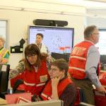 Bellevue staff work to assess the infrastructure damage to the city as part of the mock earthquake scenario being run for emergency management training. Evan Pappas/Staff Photo