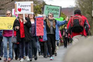 In this file photo, marchers make their way from Trinity Episcopal Church in Everett on Feb. 26, 2017. Muslim refugees admissions into the U.S. have declined by 85 percent since the Trump administration came into power in 2017, according to the International Rescue Committee. Sound Publishing file photo