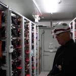 Puget Sound Energy controls engineer Paul Jusak shows the interior to one of four units at the Glacier Batter Storage Project. The shipping container is filled with lithium-ion batteries which are basically modified electric bus batteries. Aaron Kunkler/staff photo