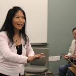 Madison Miller / staff photo                                Mingzhu Jacobson rehearses for the upcoming Women in Times of War production in a Microsoft Building 30 room with Yabin Hu.