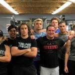 Sportswriter Shaun Scott (pictured in the Air Jordan T-shirt), who went through a weight lifting/conditioning session with the Bellevue Christian Vikings football team in July of 2018, is leaving Sound Publishing after 59 months on the job. Photo courtesy of Zeus Aguilera