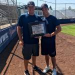 Bellevue Bulldogs associate head coach/hitting coach David Olson, left, poses for a quick picture with Bulldogs baseball player Garrett Gants on July 30. Gants was selected to the All-Region baseball team, which was voted on by the American Baseball Coaches Association. Shaun Scott/staff photo