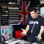 Golub marveling at his copies of Duran Durans early photos. Madison Miller / staff photo