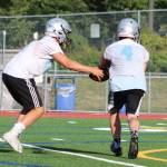 The Saints run their new offense during practice. Benjamin Olson/ staff photo