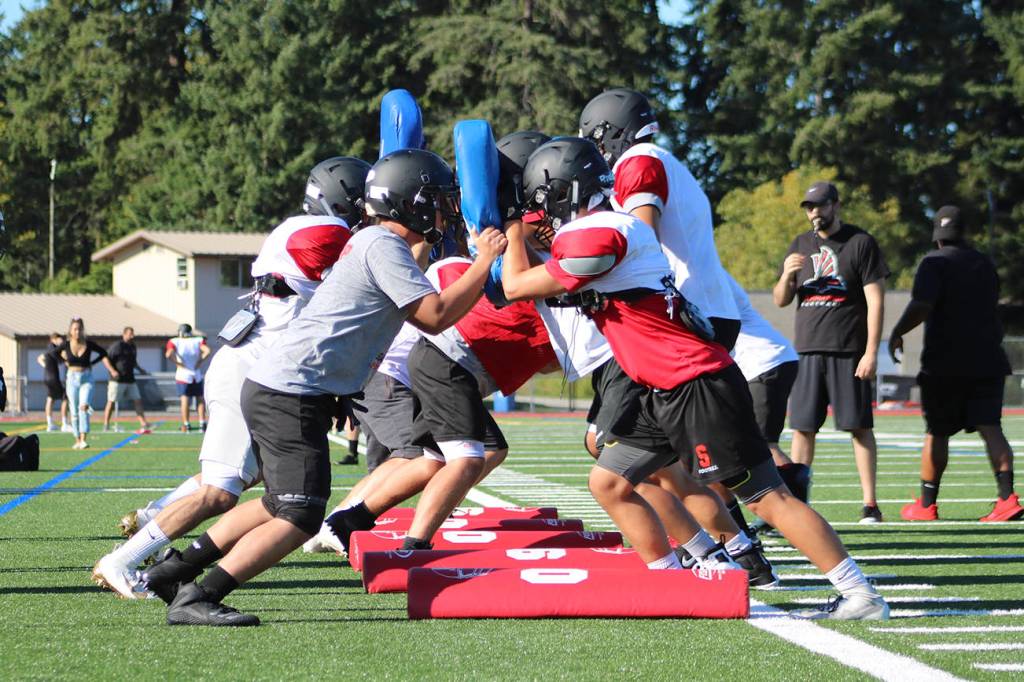 Totem linemen run through drills during their fall practice. Benjamin Olson/ staff photo