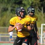 Sammamish quarterback Josue Lara drops back to throw the ball during practice. Benjamin Olson/ staff photo