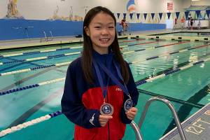 Synchronized swimmer reaches the podium