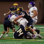 Bellevue defensive lineman Henry Hawblitzel tackles Garfield running back Avery Morrow in the 28-27 Wolverine victory on Sept. 20. Photo courtesy of Stephanie Ault Justus