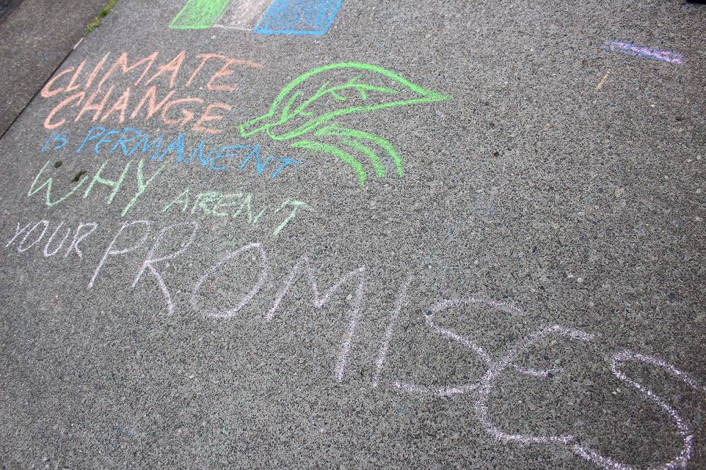 A chalk message Climate change is permanent. Why arent our promises? Madison Miller/staff photo