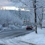 Several roads in King County, including the Snoqualmie Parkway, were closed when a brief snow storm struck the region last February. File photo