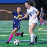 Bellevue midfielder Hinana Takashima and Juanita defender Noelle Hall both go for the ball during the Wolverines 1-0 victory on Oct. 1. Photo courtesy of Stephanie Ault Justus