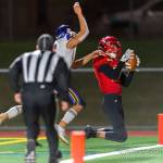 Newport wide receiver Joey Winter catches a touchdown pass during their 7-6 loss to Issaquah on Oct. 4. Photo courtesy of Patrick Krohn/Patrick Krohn Photography