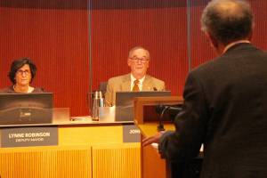 Blake Peterson/staff photo                                From left to right: Deputy Mayor Lynne Robinson, Mayor John Chelminiak and lawyer J. Richard Aramburu.