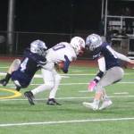 Interlake linebacker Corey Parker sacks Juanita quarterback Tyler Schropp in the Saints 21-8 loss on Oct. 18. Benjamin Olson/staff photo