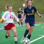 Photo courtesy of Stephanie Ault Justus                                Newport midfielder Elsie Bencke (21) chases after Bellevue midfielder Kennedy Shorett (11) in the Wolverines 4-0 win on Oct. 19.