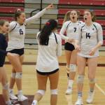 The Saints celebrate a point during a 3-1 district tournament victory over West Seattle on Nov. 14. Benjamin Olson/staff photo