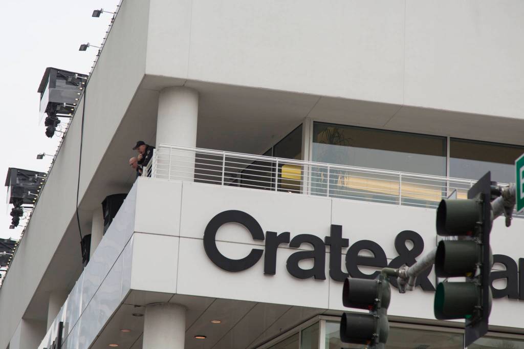 Police leaders look down from above, giving directives to officers down below. They waited to spot drivers and pedestrians disobeying the law. Ashley Hiruko/staff photo