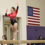 Sammamish freshman Micah Laughary performs her beam routine during a meet on Jan. 9 at Issaquah High School. Benjamin Olson/staff photo