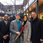 Bellevue councilmember Jeremy Barksdale, CFH executive director David Bowling, Mayor Lynne Robinson and Deputy Mayor Jared Nieuwenhuis celebrate the opening of CFHs permanent year-round mens shelter on Jan. 13. Courtesy photo