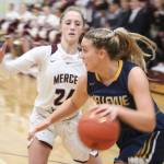 Bellevue junior Sara Bowar tries to get around Mercer Islands Grace Shaddle during the Wolverines 58-49 loss on Feb. 7 at Mercer Island High School. Benjamin Olson/staff photo