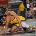 Bellevue Christians DeAunte Epp, top, battles Luis Perez of Forks at Mat Classic XXXII. Photo courtesy of Patrick Krohn