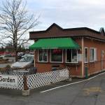 Mitchell Atencio/Staff Photo                                A customer orders a drink at the drive-thru of Megans Coffee Corner in Bellevue on Feb. 25.