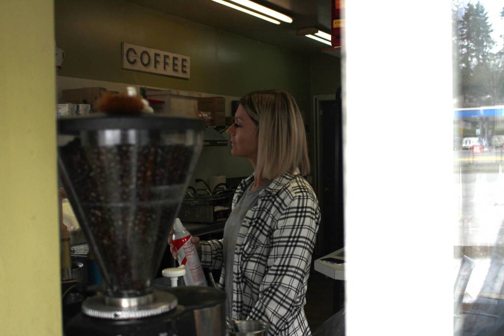 Laura French prepares a drink at Megans Coffee Corner in Bellevue, WA, on Feb. 25, 2020. Mitchell Atencio/Staff Photo