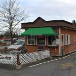 Mitchell Atencio/Staff Photo                                A customer orders a drink at the drive-thru of Megans Coffee Corner in Bellevue on Feb. 25.