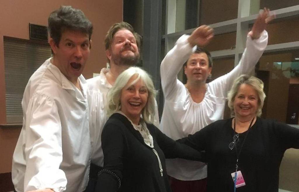Leslie Foley (center) with volunteer Caroline Atwood and actors Michael Faulkner, Tiger Reel and Dan Saski at the Northshore Performing Arts Foundations Reduced Shakespeare show last October. Photo courtesy NPAF