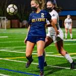 Bellevue junior Kendall Serres, left, battles Interlake senior Audrey Doran for the ball on March 16. Bellevue won, 3-0, on goals from senior Lily Ramos, senior Morgan Pingree and freshman Alex Buck. Photo courtesy of Stephanie Ault Justus