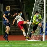 Bellevue goalkeeper Zach Sandoval blocks a shot by a Newport player while Bellevues Edmund Justus looks on during a soccer match on May 11. Bellevue won, 3-2, on Daniel Xus goal with one minute left in overtime. Bellevue scored twice in the first half with goals by Kavon Arbabi and Andrew Rose, and Newport equalized in the second half with goals by Ryan Clark. Photo courtesy of Stephanie Ault Justus