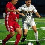 Newports Mikio Yap and Charlie Clemons scored goals in the Knights 2-0 victory over Bellevue on May 25. Pictured is Yap (17) and Bellevues Adam Chang (27). Photo courtesy of Stephanie Ault Justus