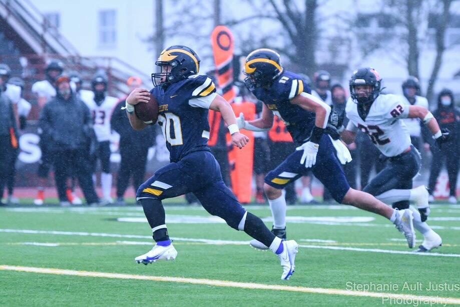Bellevues William Wang scores the second of his two touchdowns. Also pictured is Kennewicks Geo Perez and Bellevues Hogan Hansen. Photo courtesy of Stephanie Ault Justus