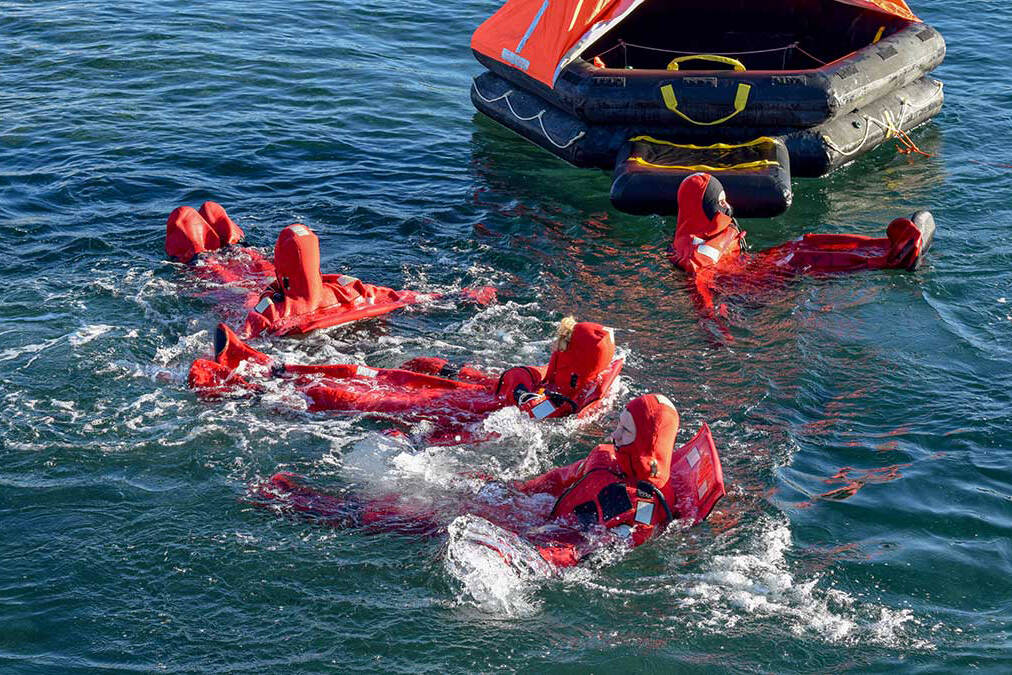 Port Townsend Maritime Academy students during cold-water emergency drill training. (Photo credit: Northwest Maritime Center)