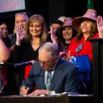 Photo by Olivia Vanni/The Herald
Governor Jay Inslee signs bill HB 1571, a bill relating to protections and services for indigenous persons who are missing, murdered, or survivors of human trafficking, into law at the Tulalip Resort on March 31, 2022.