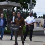 John Taylor, director of the King County Department of Local Services, speaks about the fireworks ban in Skyway on June 14. Behind Taylor (from left): King County Fire Marshal Chris Ricketts, King County Councilmember Girmay Zahilay, Skyway Fire Chief Eric Hicks and King County Councilmember Joe McDermott. Photo by Conor Wilson/Valley Record