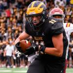 Bellevue High School's junior and tight end, Hogan Hanson (#11), scores a touchdown. Courtesy of Stephanie Ault Justus.