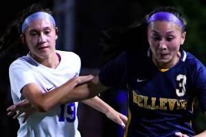 Bellevue junior Lillian McAughan (#3) dribbles the ball against Stadiums #19. Courtesy of Stephanie Ault Justus.