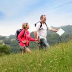 Senior couple hiking in natural landscape