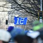 A 12th man flag waves in the wind. Photos by Ben Ray / Sound Publishing