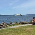 People watch the ferry from Mukilteo Lighthouse Park. Photo courtesy of Mindy Stern