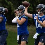 Quarterbacks Jalen Milroe, Drew Lock and Sam Darnold warm up for the Seahawks during training camp July 28 at the Virginia Mason Athletic Complex in Renton. Photo provided by Maria Dorsten