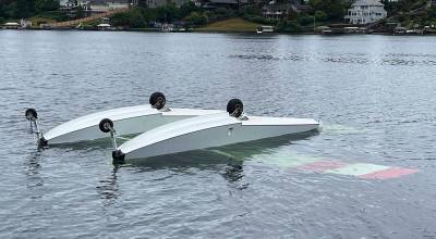 A seaplane floats upside down in Lake Meridian on Aug. 24, 2024. Residents and first responders rescued pilot Alan Williams from the submerged plane. COURTESY PHOTO, Puget Sound Fire